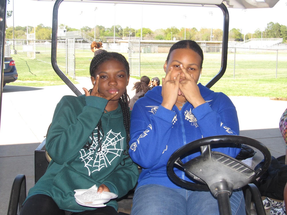 a picture of two girls from sophmore year track team.