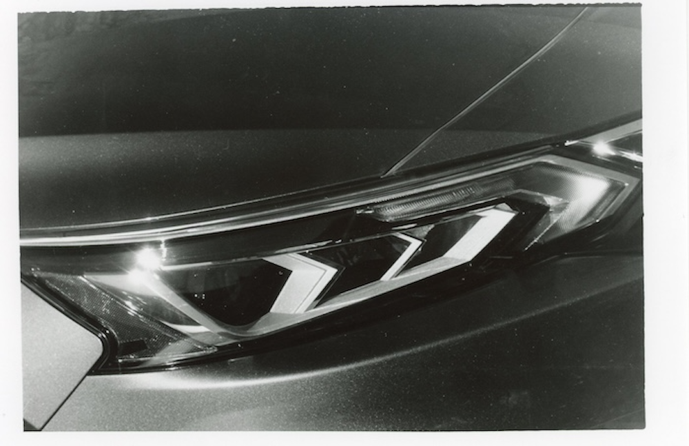 a picture of someones headlight.