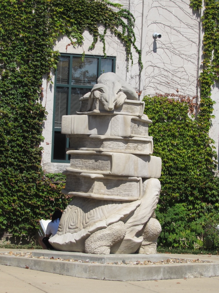 a picture of the tortise and hare statue at the urbana free library.
