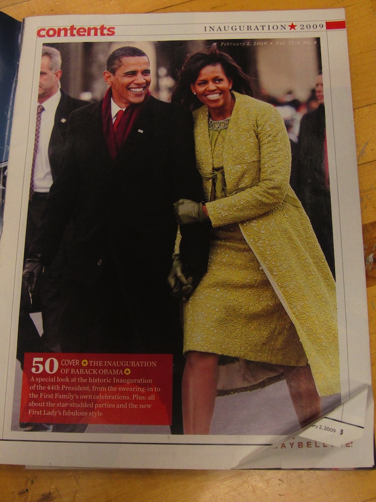 a picture of former preident obama and his wife on a magazine page.