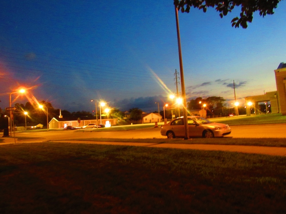 a picture of the street outside my house at night.